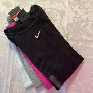 All 4 Nike sz L women’s tank tops. Black, gray, mint, fuchsia